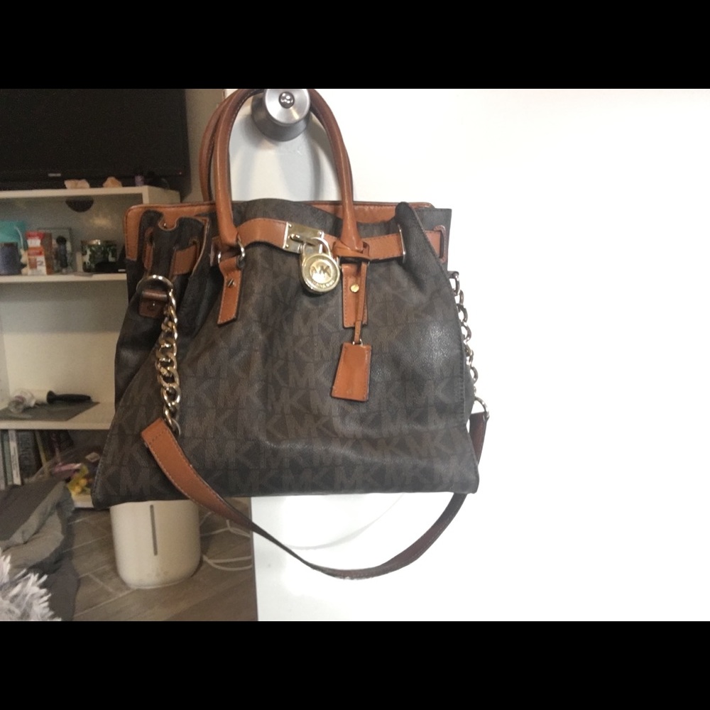 Michael Kor’s brown and tan bag AUTHENTIC